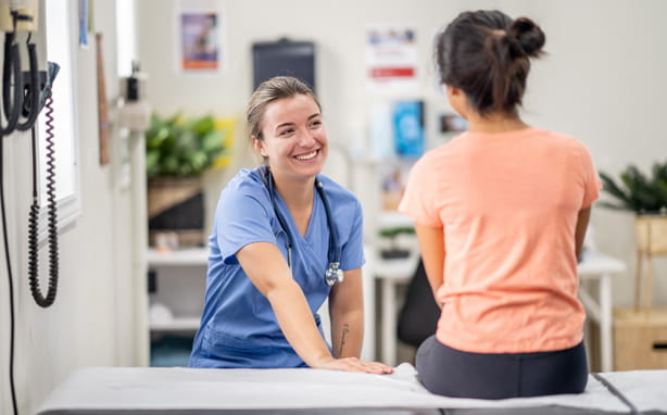 Tween patient feels comfortable talking with nurse.